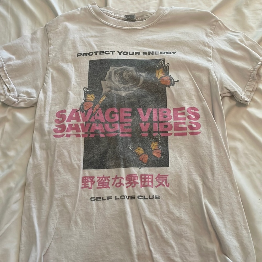 White graphic tee from Spencer’s